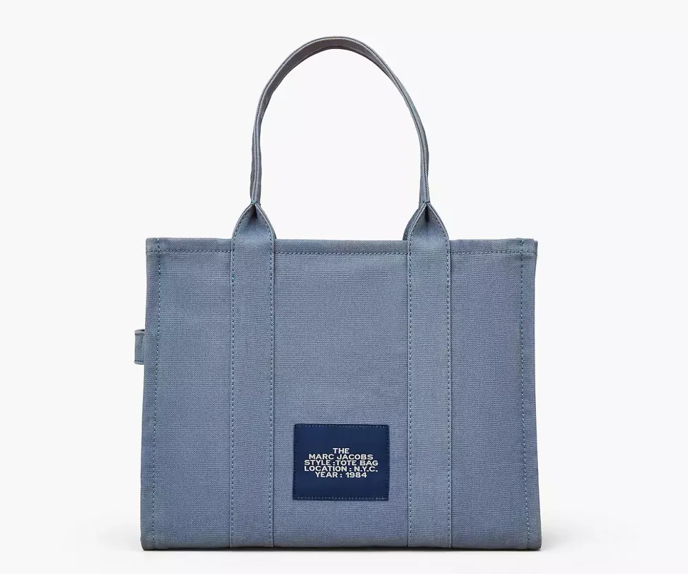 【関税&送料込】Marc Jacobs Large Blue Shadow Canvas Tote Ba Marc Jacobs The Large Tote Bag in Blue Shadow | REVOLVE